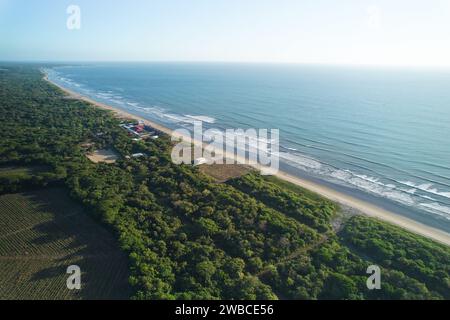 Wide panorama of ocean beach aerial drone view on sunset time Stock Photo