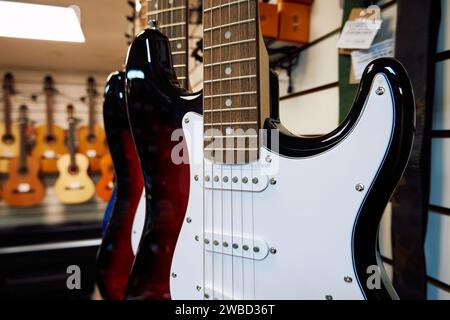 Electric guitar in a music shop. Close-up of electric guitar Stock Photo