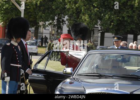 H.M.The Queen Margrethe II arrived with Crutches at ceremony that Royal Gaurd Kraen Vodder Neilsen FROM Vibe recived Queen WatchDronning Urfrom H.M.the Queen Margrethe II in Copenhagen ,Queen walks with the help of Crutches Copenhagen Denmark June 23,2006 Stock Photo