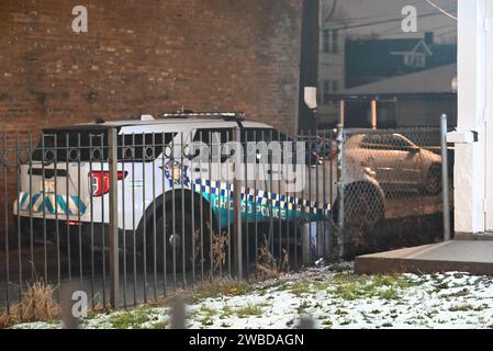 Chicago police on the scene of the homicide. Chicago police process a crime scene that occurred in the 300 block of E. 79th Street in Chicago, Illinois, United States on January 10, 2024. Tuesday, January 9, 2024 at approximately 10:16 pm CT, a 43-year-old male employee of a convenience store was in an alley when he was approached by a male suspect, who attempted to rob him. The offender fired shots during the incident, striking the victim in the head and the victim was pronounced on scene and Chicago police say that there is no one in custody. Stock Photo