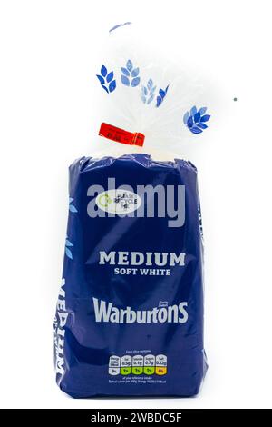 Irvine, Scotland, UK-July 21, 2023: Warburton’s branded medium soft white bread in a plastic wrapping that is only recyclable at supermarkets. Display Stock Photo