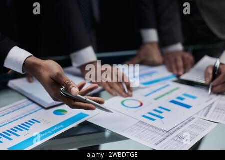 close-up. business colleagues look at the graph on the table from above Stock Photo