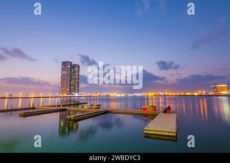 Ras Al Khaimah by night. View to beautiful bay with harbour in background Stock Photo