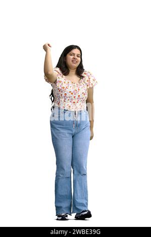 A woman, on a white background, in full height, raised his hand up Stock Photo