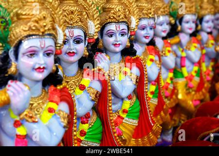 The Hindu God, Lord Krishna Idol for sale in Market in Pune, Maharashtra, India. Stock Photo