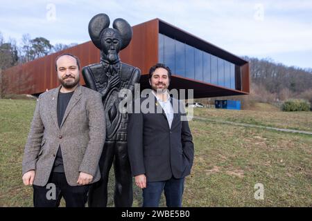 Glauburg, Germany. 10th Jan, 2024. The new director of Keltenwelt am Glauberg, Marcus Coesfeld (r), who has been in office since January 1, 2024, introduces himself at a press conference together with his deputy Christoph Röder (l). Both are standing next to a replica of the statue of the 'Celtic prince of the Glauberg' on display in the museum. The ceremonial handover of office will take place on 11.01.2024. Credit: Christian Lademann/dpa/Alamy Live News Stock Photo