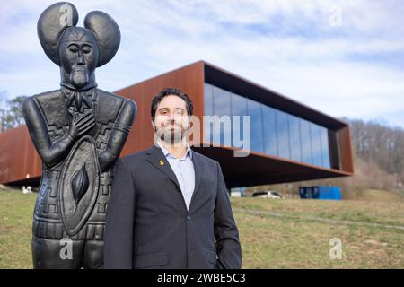 Glauburg, Germany. 10th Jan, 2024. Marcus Coesfeld has been the new director of Keltenwelt am Glauberg, Archäologisches Landesmuseum Hessen, since January 1, 2024. He stands next to a replica of the statue of the 'Celtic Prince of Glauberg' on display in the museum. The ceremonial handover of office will take place on 11.01.2024. Credit: Christian Lademann/dpa/Alamy Live News Stock Photo