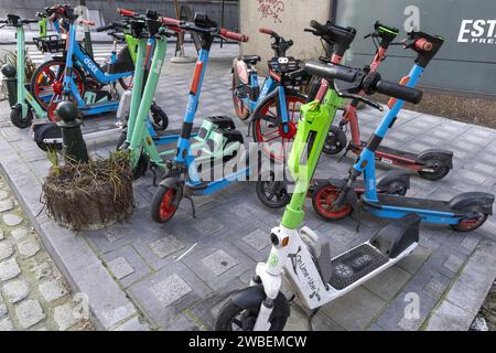 Brussels, Belgium. 10th Jan, 2024. Electric scooters of the Bolt and Tier platforms pictured in Brussels on Wednesday 10 January 2024. Today the two operators of self-service scooters and bikes announced a merger. BELGA PHOTO NICOLAS MAETERLINCK Credit: Belga News Agency/Alamy Live News Stock Photo