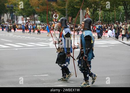 Kyoto, Japan - October 22, 2007: Warriors from the retinue in traditional military uniforms of Sengoku period with weapons during historical reconstru Stock Photo