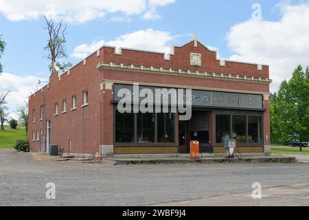 Hooper, WA, USA -May 22, 2023; McGregor's brick company store building in small community of Hooper with MacGregor's sign Stock Photo
