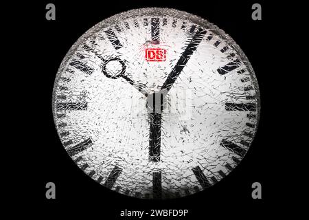 Shattered glass on a railway station clock at night, detail, symbolic photo, Witten, North Rhine-Westphalia, Germany Stock Photo