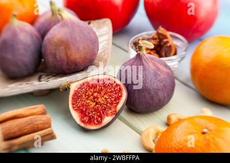 sliced figs on wood background Stock Photo