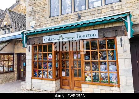 Bourton on the Water Cotswolds village, Cedars Bourton is a gift shop on the high street selling toy bears Paddington near and Charlie bears too,UK Stock Photo