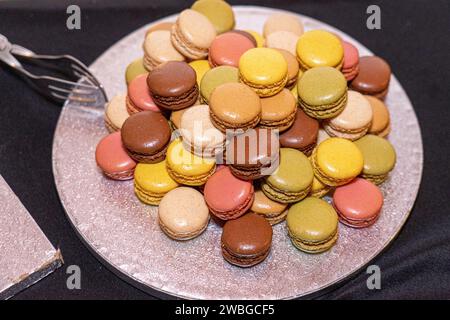 plate full of macarons of different colors Stock Photo