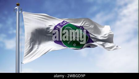 London, UK, July 3 2023: The Championships Wimbledon flag waving on a clear day. Wimbledon Championships is a major tennis tournament. Illustrative ed Stock Photo