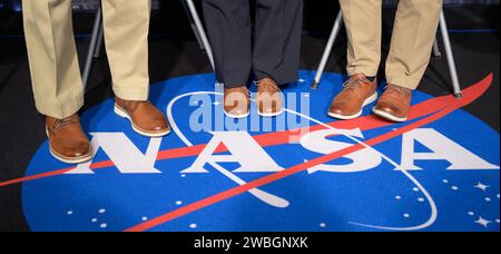 NASA Administrator Bill Nelson, left, NASA Deputy Administrator Pam Melroy, and NASA Associate Administrator Bob Cabana, right, pose for a photograph showing how they ended up wearing smilier shoes for a NASA town hall event, Wednesday, July 19, 2023, at the NASA Headquarters Mary W. Jackson Building in Washington. Photo Credit: (NASA/Bill Ingalls) Stock Photo