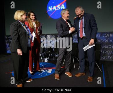 NASA Associate Administrator Bob Cabana, 3rd from left,  shakes hands with Incoming NASA Associate Administrator Jim Free, right, as NASA Deputy Administrator Pam Melroy, left, and NASA Deputy Associate Administrator Casey Swails look on at the conclusion of a NASA town hall event, Tuesday, Dec. 12, 2023, at the NASA Headquarters Mary W. Jackson Building in Washington. Photo Credit: (NASA/Bill Ingalls) Stock Photo