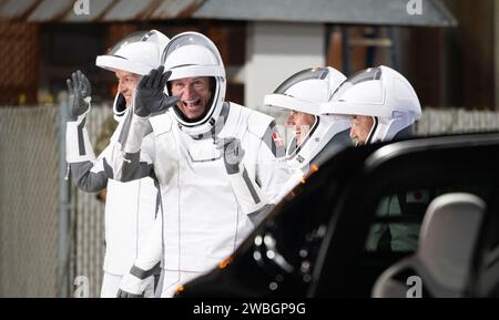 Roscosmos cosmonaut Konstantin Borisov, left, ESA (European Space Agency) astronaut Andreas Mogensen, second from left, NASA astronaut Jasmin Moghbeli, second from right, and Japan Aerospace Exploration Agency (JAXA) astronaut Satoshi Furukawa, right,  wearing SpaceX spacesuits, are seen as they prepare to depart the Neil  A. Armstrong Operations and Checkout Building for Launch Complex 39A to board the SpaceX Dragon spacecraft for the Crew-7 mission launch, Saturday, Aug. 26, 2023, at NASA’s Kennedy Space Center in Florida. NASA’s SpaceX Crew-7 mission is the seventh crew rotation mission of Stock Photo