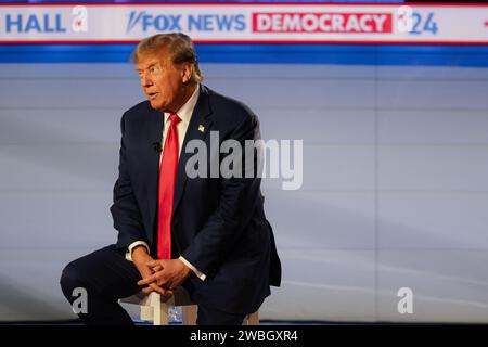 Des Moines, United States. 10th Jan, 2024. Former President Donald Trump speaks on stage during a Fox News Iowa Town Hall at the Iowa Events Center on January 10, 2024 in Des Moines, Iowa. (Photo by Jon Cherry/Sipa USA) Credit: Sipa USA/Alamy Live News Stock Photo