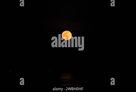 Full moon seen from the Amazon River, in the northern region of Brazil. Stock Photo