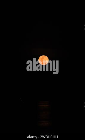 Full moon seen from the Amazon River, in the northern region of Brazil. Stock Photo