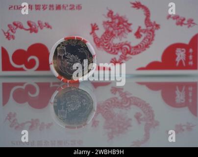 The 2024 New Year commemorative coins are issued in Hangzhou City, east China's Zhejiang Province, 9 January, 2024. Stock Photo