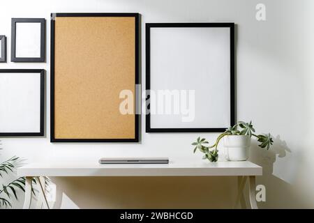 Set of black frames on white wall with copy space Stock Photo