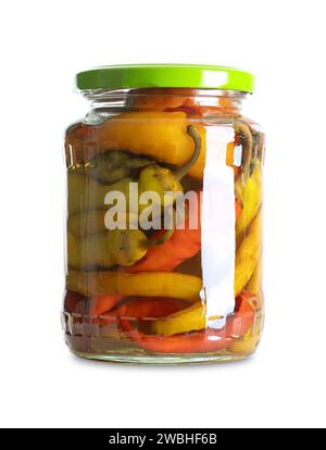 Pepperonis, pickled cayenne peppers in a glass jar. Green, red, and yellow fruits of moderately hot chili peppers, pasteurized and preserved in brine. Stock Photo