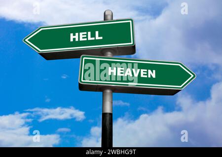 Two direction signs, one pointing left (Hell), and the other one, pointing right (Heaven). Stock Photo