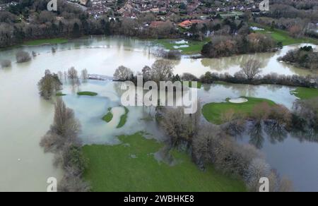 Golf course greens are under water as flooding is still a problem in Peterborough after the River Nene breached its banks at Orton Mere in Peterborough, Cambridgeshire, on 8th January 2024. Stock Photo