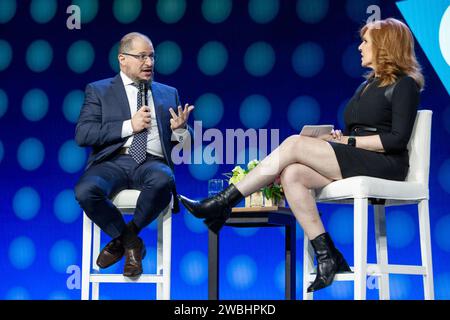 Las Vegas, USA. 10th Jan, 2024. Cristiano Amon (L), President and CEO of Qualcomm, and Liz Claman, Anchor, FOX Business Network, speak at a keynote address during CES 2024 - Day 1 at the Venetian casino and resort in Las Vegas, NV on January 10, 2024. (Travis P Ball/Sipa USA) Credit: Sipa USA/Alamy Live News Stock Photo