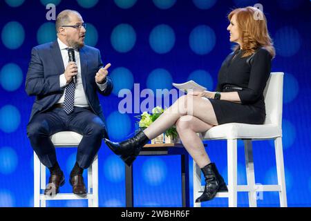 Las Vegas, USA. 10th Jan, 2024. Cristiano Amon (L), President and CEO of Qualcomm, and Liz Claman, Anchor, FOX Business Network, speak at a keynote address during CES 2024 - Day 1 at the Venetian casino and resort in Las Vegas, NV on January 10, 2024. (Travis P Ball/Sipa USA) Credit: Sipa USA/Alamy Live News Stock Photo