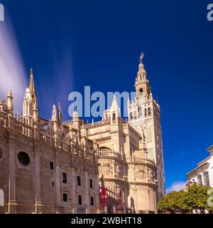 Long exposure of the iconic La Giralda tower of the basilica in the centre of Seville. Stock Photo