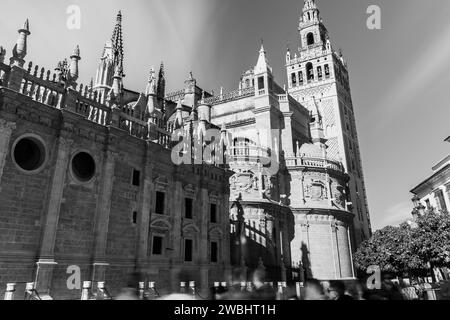 Black and white image with long exposure of the iconic La Giralda tower of the basilica in the centre of Seville. Stock Photo