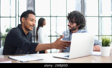 Business Professionals Engaged in Collaborative Meeting Stock Photo
