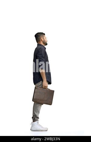 A man, on a white background, in full height, with a briefcase. Stock Photo