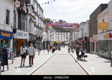 Shops and shoppers on Union Street, Torquay in Devon in the United Kingdom Stock Photo