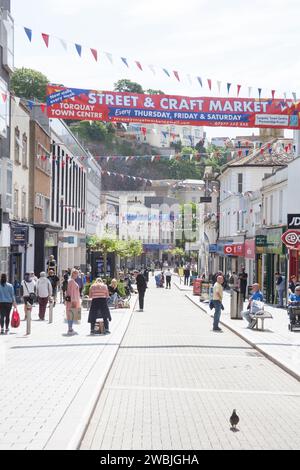 Shops and shoppers on Union Street, Torquay in Devon in the United Kingdom Stock Photo