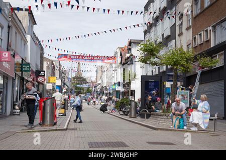 Shops and shoppers on Union Street, Torquay in Devon in the United Kingdom Stock Photo