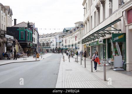 Shops and shoppers on Fleet Street, Torquay in Devon in the UK Stock Photo