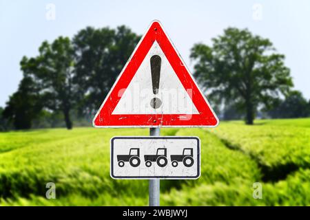 Traffic Signs With Exclamation Marks And Tractors In A Row, Symbol Photo Peasant Protests, Photo Montage Stock Photo