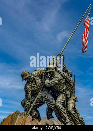 Washington D.C., USA; June 2, 2023: Upright photo of the Marine Corps Battle of Iwo Jima war memorial with the American flag. Stock Photo