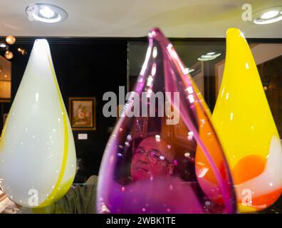 London; UK; 11th January; 2024. The Mayfair Antiques & Fine Art Fair opens at the Marriott Hotel in Grosvenor Square from 11-14 Jan. Highlights include: Coloured glassware on the Markov stand. Credit: Malcolm Park/Alamy Live News Stock Photo