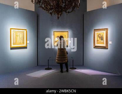 Tourist visiting the photographic exhibition of the famous Italian painter Giorgio Morandi, Palazzo Reale, Milano, Italy - January 3, 2024 Stock Photo