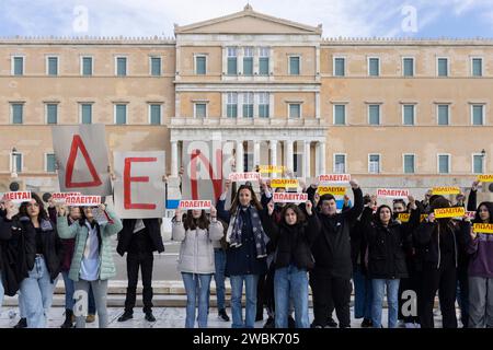 Athen, Greece. 11th Jan, 2024. Students hold placards reading 'Not for sale' during a demonstration against the planned admission of private universities. Student associations and the teachers' union OLME had called for the protests. Credit: Socrates Baltagiannis/dpa/Alamy Live News Stock Photo