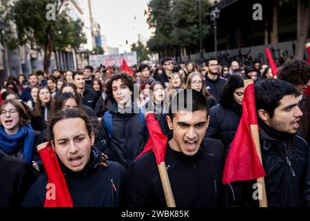 Athen, Greece. 11th Jan, 2024. Students chant slogans during a demonstration against the planned admission of private universities, including: 'No to private universities', 'Hands off our education' and 'Education must remain free for all'. Student associations and the teachers' union OLME had called for the protests. Credit: Socrates Baltagiannis/dpa/Alamy Live News Stock Photo