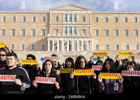 Athen, Greece. 11th Jan, 2024. Students hold placards with the words 'For Sale' during a demonstration against the planned admission of private universities. Student associations and the teachers' union OLME had called for the protests. Credit: Socrates Baltagiannis/dpa/Alamy Live News Stock Photo