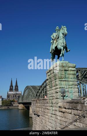 Germany, North Rhine-Westphalia, Cologne, Cologne Cathedral, Hohenzollern Bridge, Rhine, equestrian statue of Kaiser Wilhelm II. Stock Photo