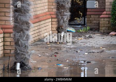 Wraysbury, UK. 11th January, 2024. Some gardens remain flooded in Wraysbury, Berkshire after the River Thames burst its banks earlier this week. After a terrible week for some residents near the River Thames the flooding is finally subsiding in Wraysbury, Berkshire. Now the clean up begins. Credit: Maureen McLean/Alamy Live News Stock Photo