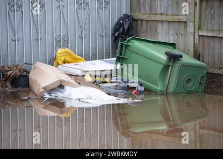 Wraysbury, UK. 11th January, 2024. Some gardens remain flooded in Wraysbury, Berkshire after the River Thames burst its banks earlier this week. After a terrible week for some residents near the River Thames the flooding is finally subsiding in Wraysbury, Berkshire. Now the clean up begins. Credit: Maureen McLean/Alamy Live News Stock Photo